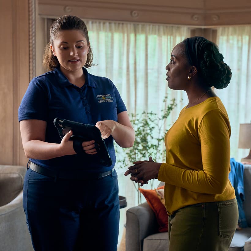 A Performance Comfort Advisor discuss our Comfort360 Membership benefits with a homeowner.